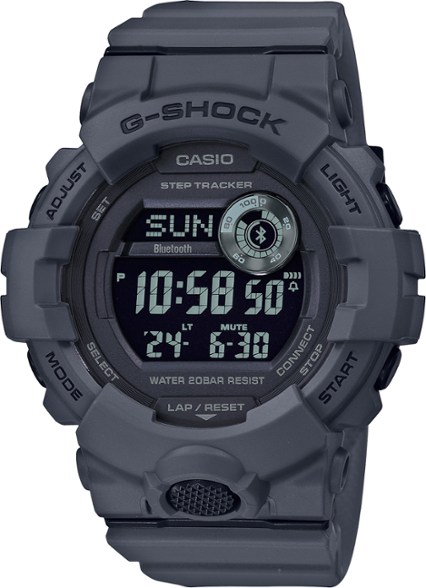 Front view of the digital watch displaying step tracker and dual time zones.