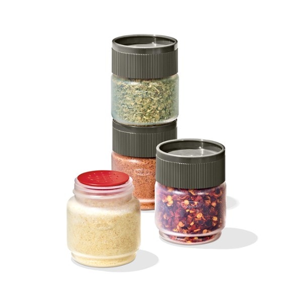Adventure Spice Shaker Set displayed with spices inside at a campsite.