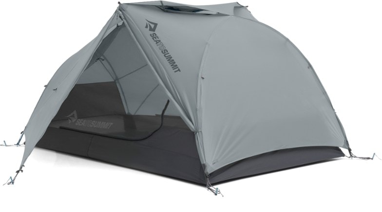 Telos TR2 Adventure Tent set up in a scenic bikepacking location, showcasing its spacious interior and large vestibules.