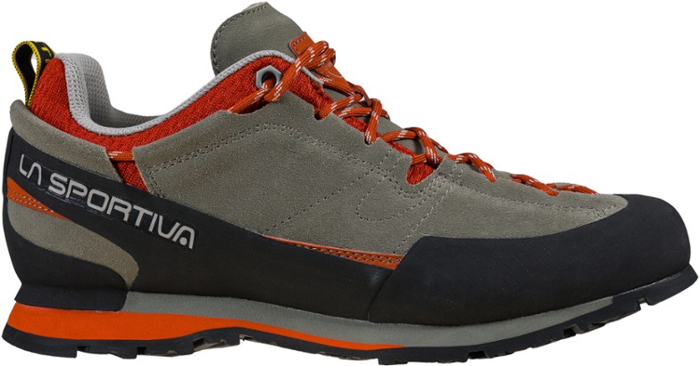 Close-up of La Sportiva Boulder X approach shoes on rocky path