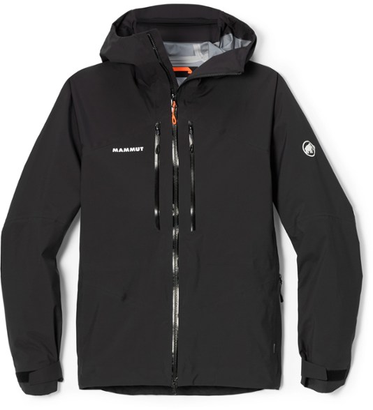 Men wearing the Mammut Taiss HS Hooded Jacket during a hike in the mountains, showcasing its durable design and features.