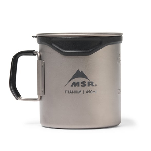 Titanium Ultralight Backpacking Mug with silicone lip saver in use while hiking.
