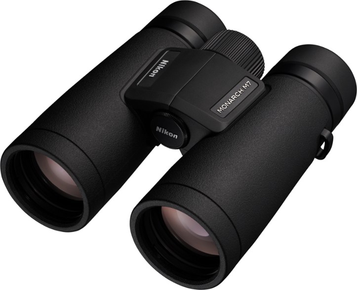 Nikon Monarch M7 10x42 binoculars on a hiking trail, perfect for birdwatching.