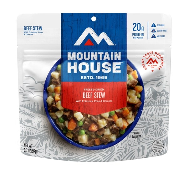 A steaming bowl of Mountain House Beef Stew ready for outdoor dining.