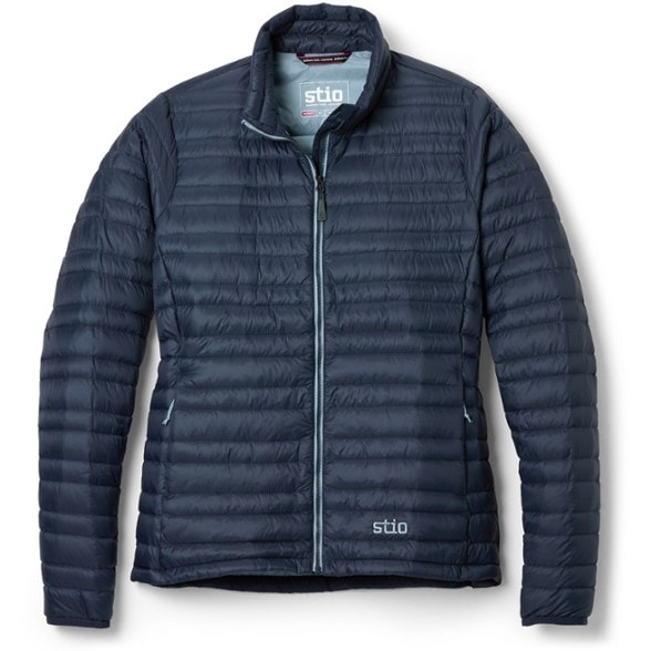 Front view of Stio Women's Pinion Down Sweater in action during a hike, highlighting its lightweight design.
