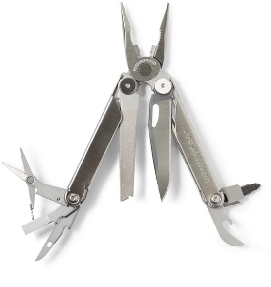 Close-up of the TrailMate Curl Pro multi-tool showing open knife blade and scissors