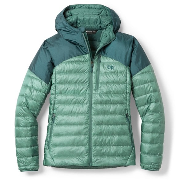 Ultimate Women's Down Hoodie in action on a hiking trail, showcasing its lightweight design and insulation.