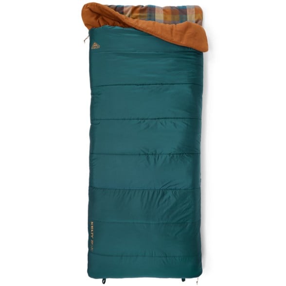 Top-down view of Kelty Wayback 20 outdoor sleeping bag laid out next to camping gear
