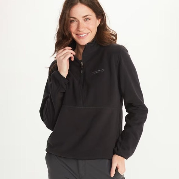 Front view of Marmot Rocklin TrailLite fleece jacket worn outdoors by a female hiker