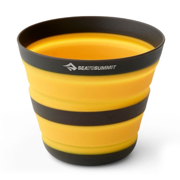Frontier Ultralight Camping Mug shown in a scenic outdoor setting, perfect for camping.
