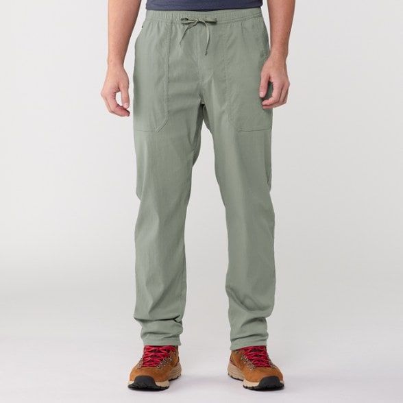 Versatile Stretch Zion Men's Outdoor Pants in action during a hike.