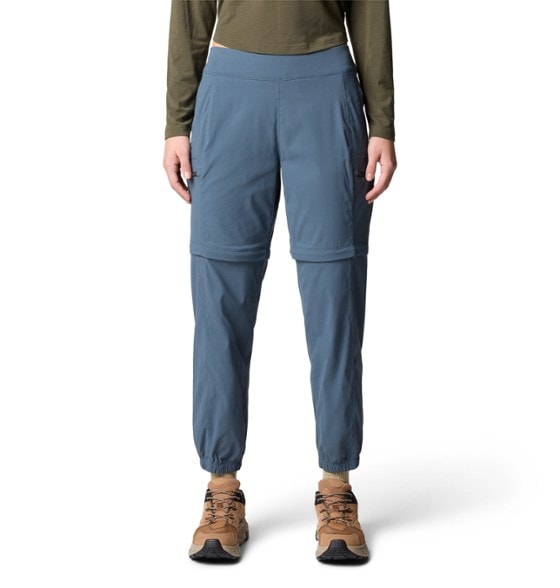 Side view of women's convertible joggers showcasing the zip-off feature for shorts.
