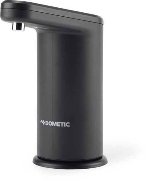 Close-up view of the rechargeable water pump attached to an outdoor water jug with water flowing