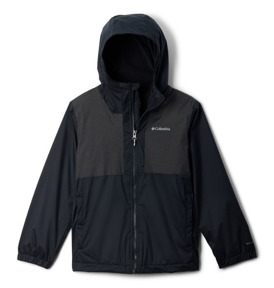 Columbia Rainy Trails II jacket on a boy hiking in the rain, showcasing its waterproof design.