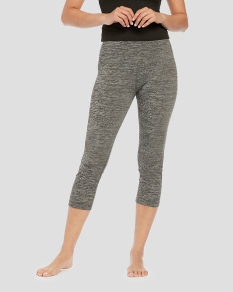Cloud Nine Women's Midweight Base Layer Capri Pants displayed outdoors