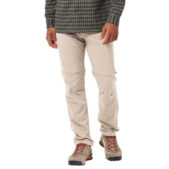 Explorer's Edge Men's Convertible Pants showcasing zip-off feature in a natural setting