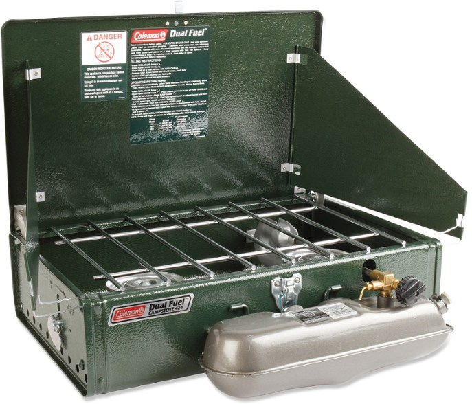 Trailblazer Dual Fuel Camping Stove in action at a campsite with pans cooking.