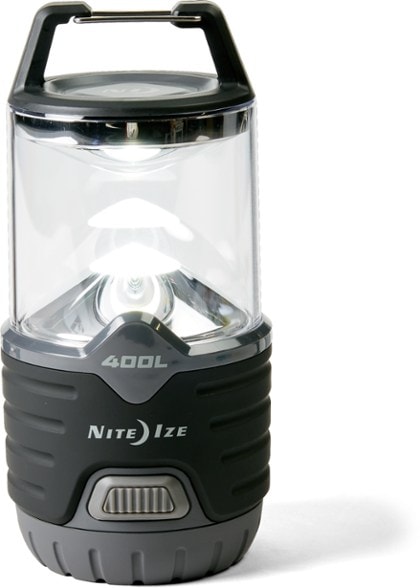 Luminous 400 Outdoor Lantern illuminating a campsite at night.