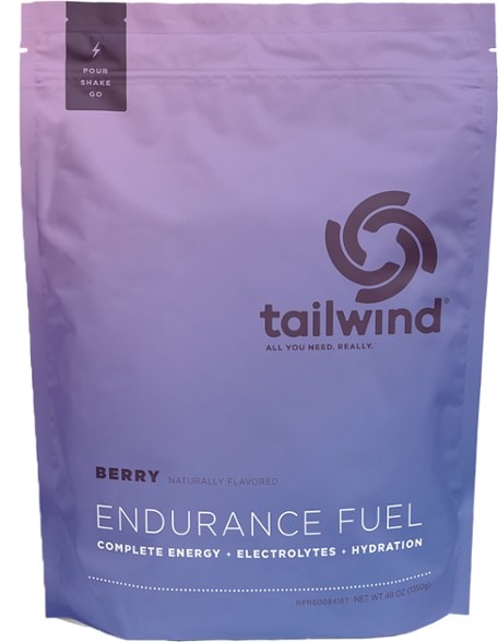 Hydration Master Endurance Fuel Mix being poured into a water bottle, showcasing easy mixing for athletes.