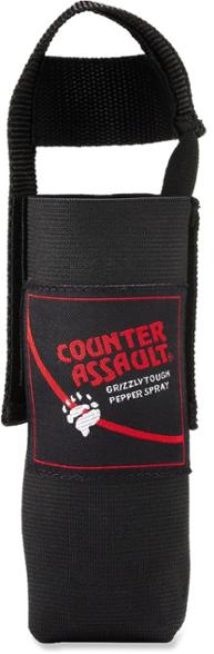 Close-up of the durable bear spray holder attached to a backpack