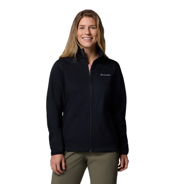 Columbia women's full-zip jacket in a cozy outdoor setting, showcasing zippered pockets and a stylish fit.