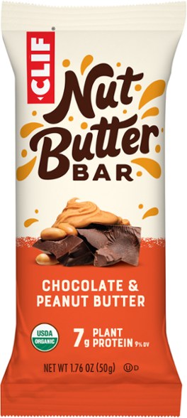 Nut Butter Bliss Energy Bar in a natural setting, perfect for hiking.