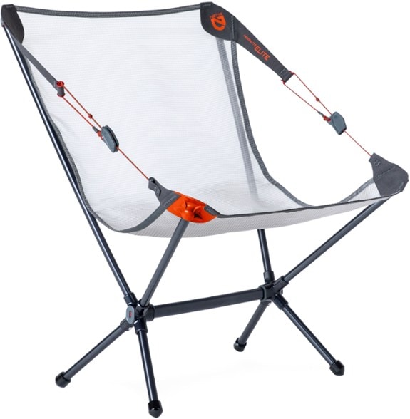 NEMO Moonlite Elite backpacking chair set against a mountain backdrop, highlighting its portability and sleek design.