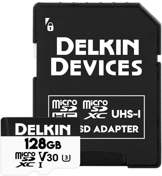 Close-up of Delkin Devices 128GB waterproof microSD card with SD adapter, highlighting its robust design.