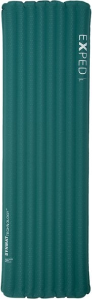Exped Dura 5R sleeping pad in a tent, demonstrating its thickness and insulation.