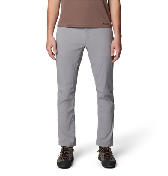 Side view of Mountain Hardwear Men's Performance Active Pants on a hiking trail.