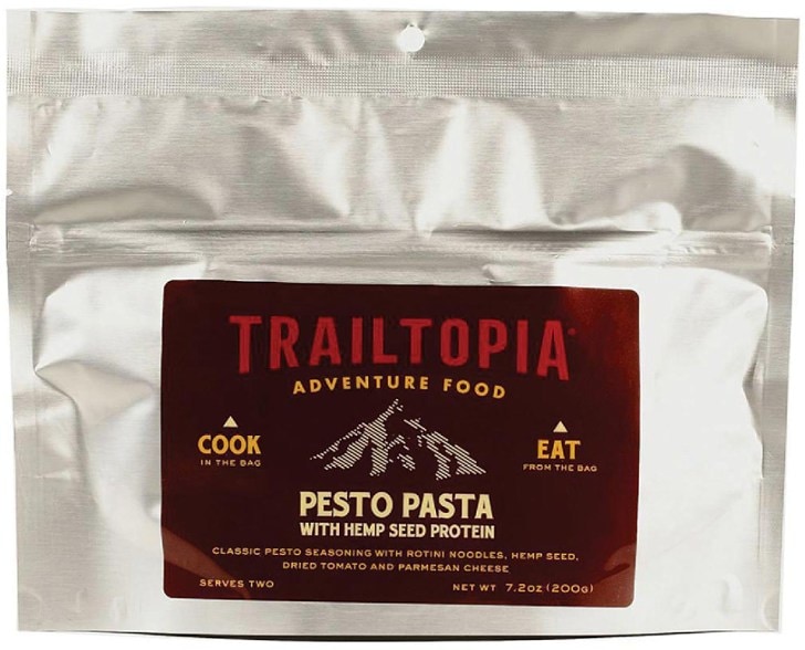 Close-up of pesto pasta with hemp protein showing creamy pesto sauce coating rotini noodles, perfect for backpacking meals