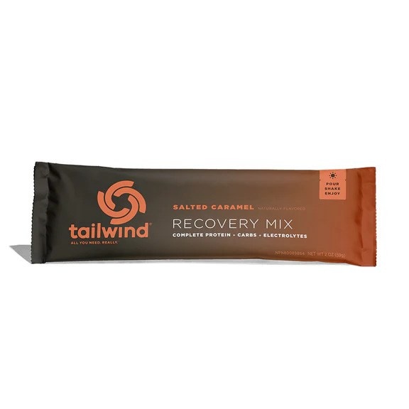 Tailwind Pro Recovery Vegan Drink Mix packet angled with visible branding and text highlighting post workout supplement benefits