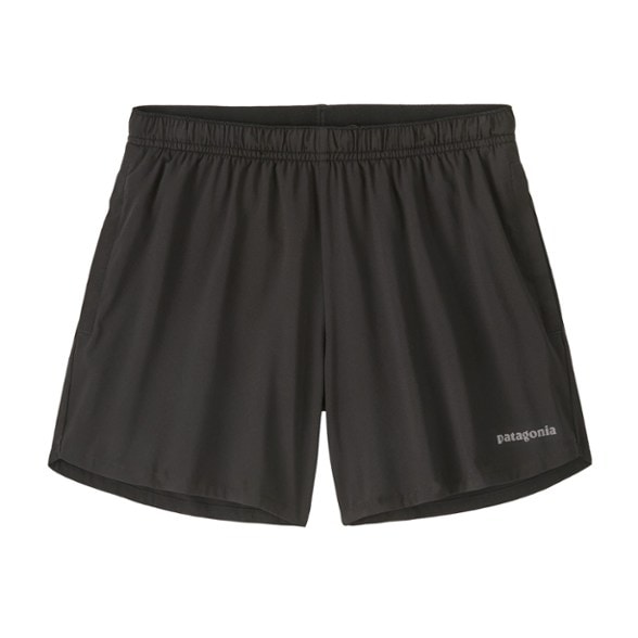 Front angle showing elastic waistband and deep side pockets on kids athletic shorts with pockets