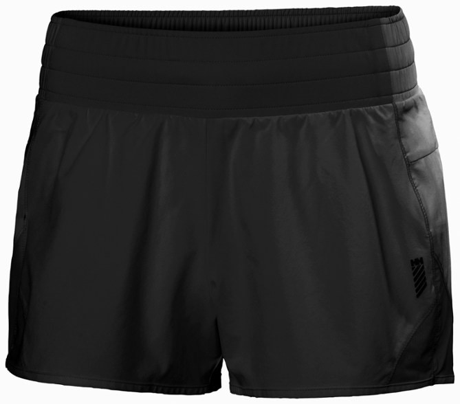 Summit Breeze Women's Hiking Shorts in a natural setting, showcasing their lightweight fabric and adjustable waistband.