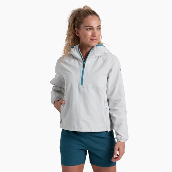 Women's packable half-zip top showcasing its lightweight design and sun protection features.