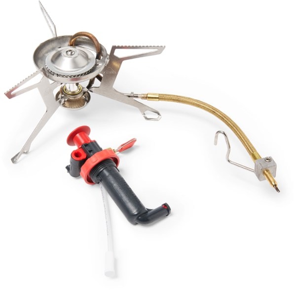 MSR WhisperLite International stove setup for a camping trip, showcasing its compactness and stability.