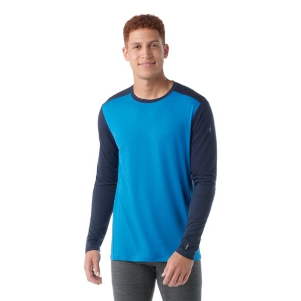 Men's lightweight merino wool base layer, front view showcasing fit and style.