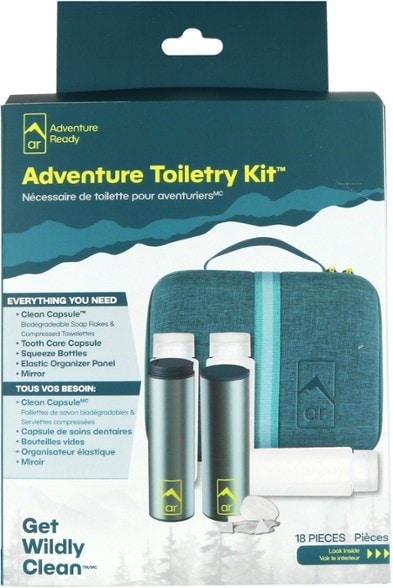 Ultimate Outdoor Toiletry Kit displayed in a camping setting with travel toiletries visible.