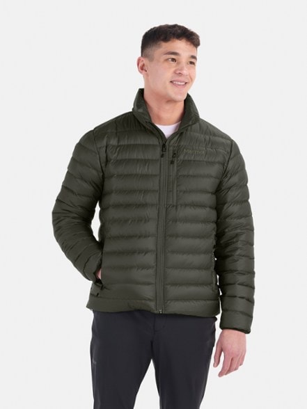 Marmot Highlander Down Jacket front view, showcasing its sleek design and water-resistant features.