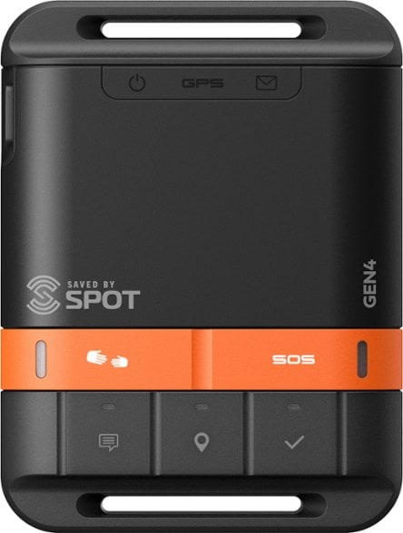 SPOT Gen4 Satellite Messenger on a hiking trail, emphasizing its ruggedness for outdoor use.