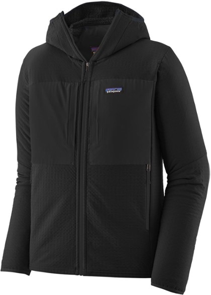 Patagonia R2 TechFace Men's Hoody in action during a winter hike, demonstrating warmth and functionality.