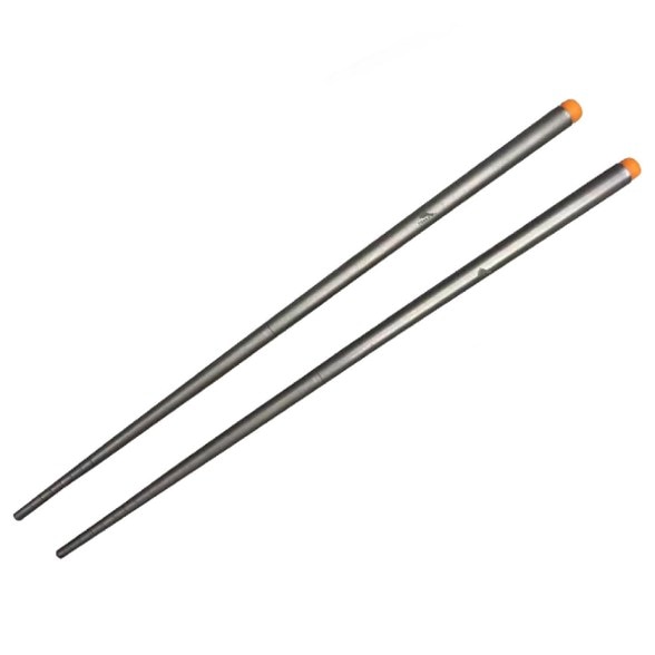 Close-up of titanium chopsticks showing collapsible design and screw mechanism