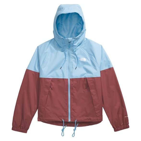 Front view of the Versatile Women's Waterproof Rain Hoodie in action during a hike, showcasing its sleek design and functionality.