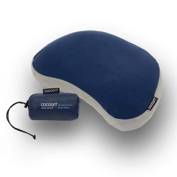 Side view of ultralight camping pillow with air core inflated and ready for use in a tent