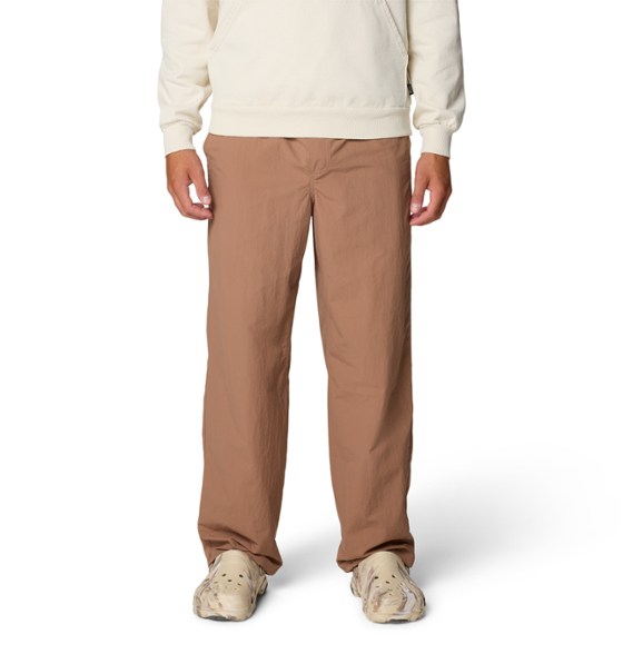 Front view of men's hiking pants with sun protection in natural outdoor setting