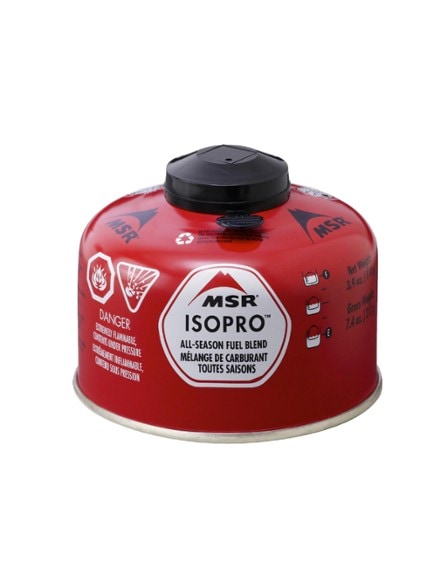 Close-up of MSR TrailFuel Pro canister attached to backpacking stove for alpine cooking