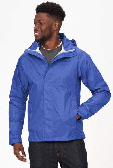 Marmot PreCip Eco Rain Jacket displayed outdoors, showcasing its breathable fabric and functional design.
