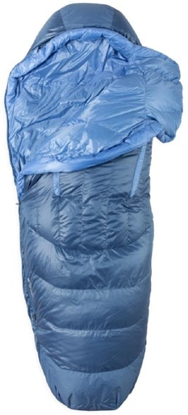 A woman comfortably sleeping in the NEMO Disco 30 sleeping bag, showcasing its Spoon® design.