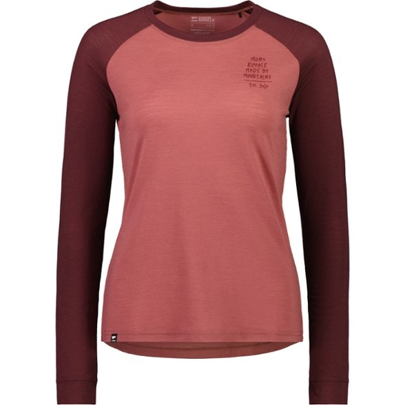 Women wearing the Elevate Merino Performance Long-Sleeve Shirt while hiking in a scenic landscape.