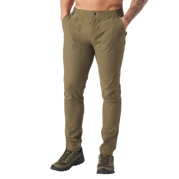 Glyder Men's Trekking Pants in action on a hiking trail, demonstrating flexibility and style.